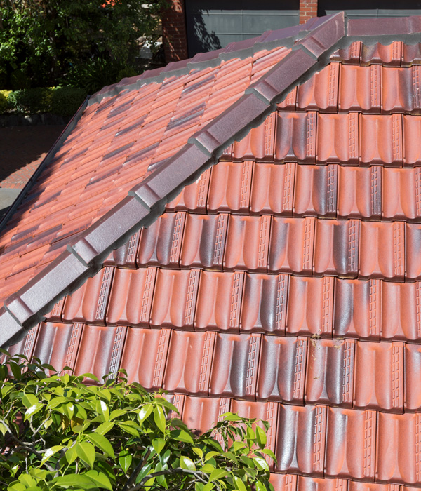 Terracotta tiles matched on a Sydney roof extension